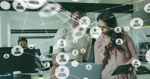 Diverse Businesswomen Networking and Analyzing Digital Data