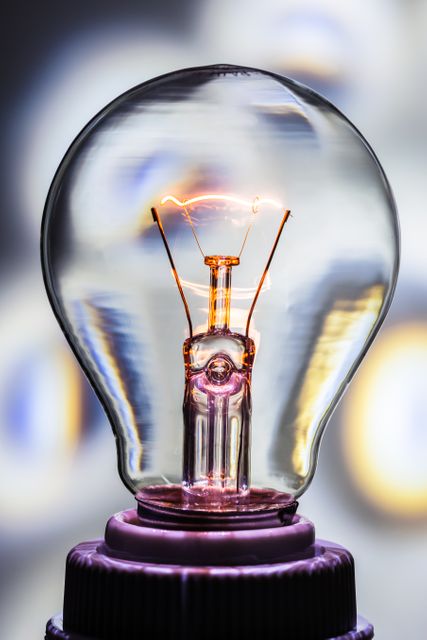 Close-up of Glowing Incandescent Light Bulb - Download Free Stock Photos Pikwizard.com