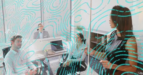 Diverse Team in Modern Meeting Room Collaborating on New Strategy