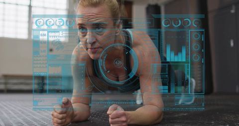 Middle-aged woman holding forearm plank with fitness hud overlay tracking core metrics