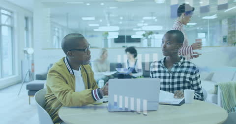 Diverse Professionals Collaborating in Modern Office with Financial Data Overlay