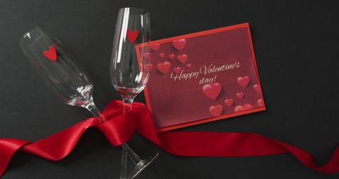 Romantic Valentine's Greeting with Glasses and Red Ribbons - Download Free Stock Images Pikwizard.com