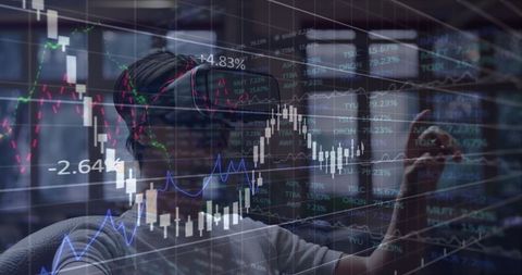 Man Using VR Headset with Financial Graphs Overlay for Data Analysis - Download Free Stock Images Pikwizard.com