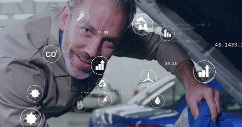 Mechanic Engaging With High-Tech Maintenance Solutions in Garage