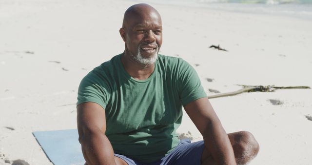 Elderly Man Practicing Yoga on Beach in Morning Sunlight - Download Free Stock Images Pikwizard.com