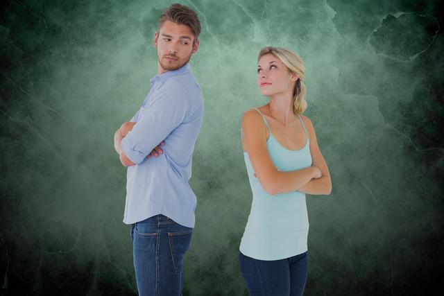 Digital composite of Couple with arms crossed arguing over green background