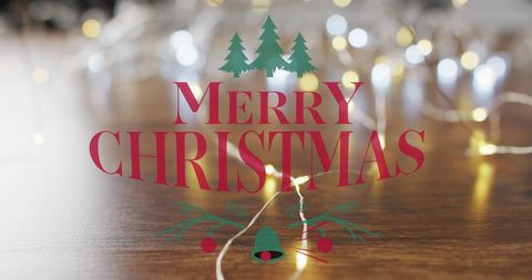 Christmas greetings over festive fairy lights background