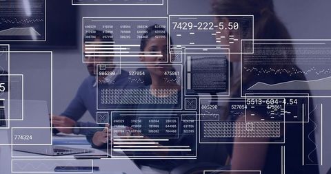 Colleagues Collaborating with Data Overlays and Dashboards in Modern Office Meeting