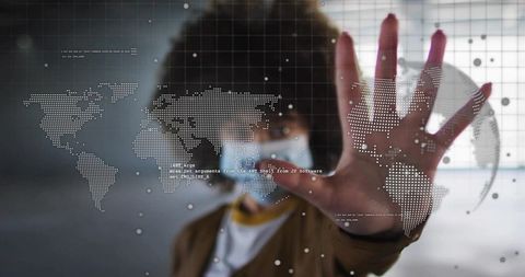 Masked woman reaching toward interactive world map hologram, digital data visualization