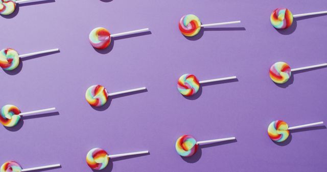 Colorful Lollipops Pattern on Purple Background - Download Free Stock Images Pikwizard.com