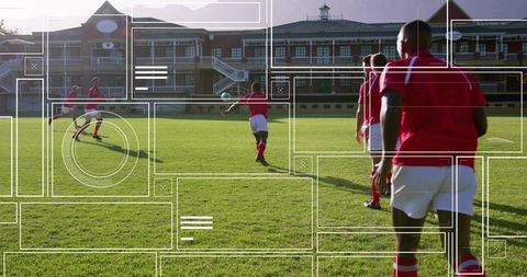 Kicking Soccer Player Leading Team Drill on Sunlit Grass Pitch, Training and Teamwork