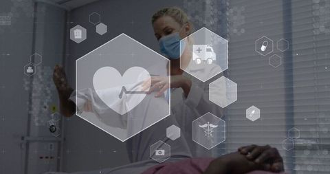 Clinician examining patient with holographic cardiac monitoring and medical visual interface