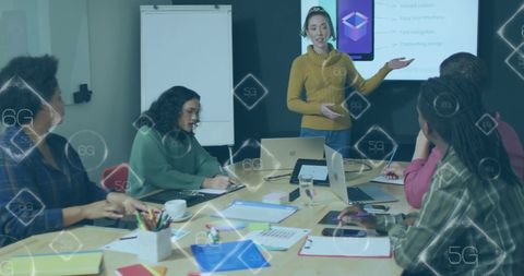 Team Meeting Focused on 5G and Business Technology In Office