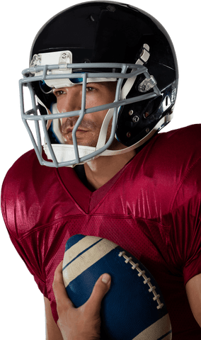 American football player in transparent helmet holding ball closeup