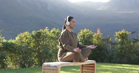 Tranquil meditation outdoor retreat with wireless headphones