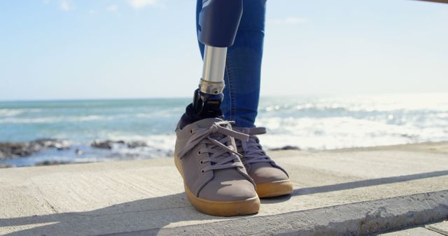 Person with Prosthetic Leg at Beachfront - Download Free Stock Images Pikwizard.com