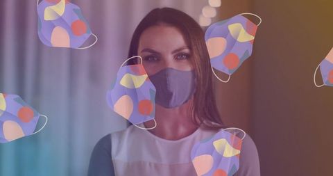 Woman wearing face mask with overlay holographic masks