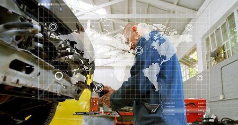 Senior mechanic repairing car engine with digital hud overlay in bright workshop