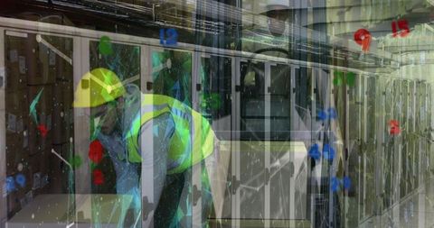 Warehouse worker inspecting servers with digital overlay