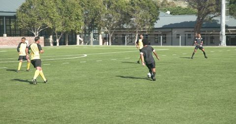 Dynamic soccer match with players attempting goal