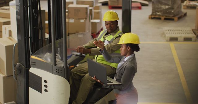 Warehouse Supervisor Instructing Worker Operating Forklift - Download Free Stock Images Pikwizard.com