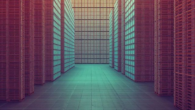 Symmetrical Wooden Pallet Corridor inside Industrial Warehouse