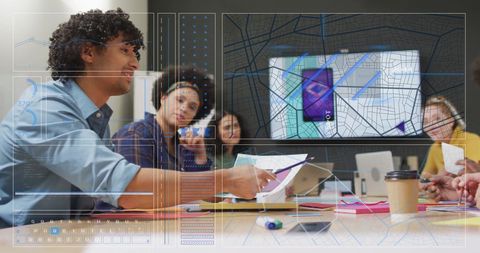 Diverse Team Analyzing Data and Charts in Meeting