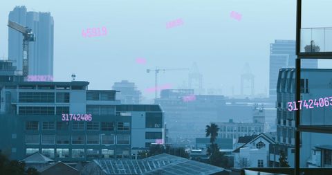 Digital data overlay on modern cityscape