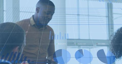 Diverse Team Discussing Financial Data with Digital Graphs - Download Free Stock Images Pikwizard.com