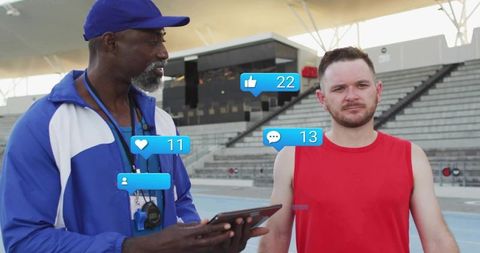 Coach using tablet to track runner performance at outdoor stadium with social engagement icons