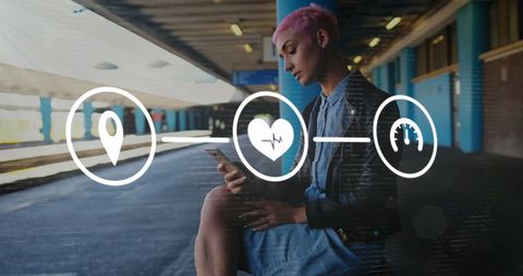 Woman Sitting on Train Platform with Integrated Digital Icons