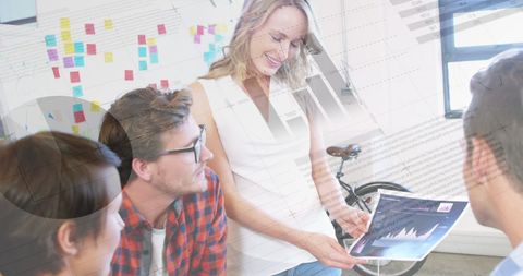 Collaborative Team Analyzing Financial Data Overlay