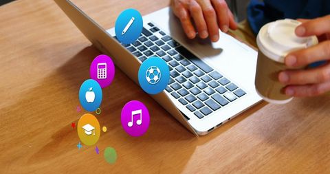 Man Using Laptop with Colorful Digital Icons Overlay