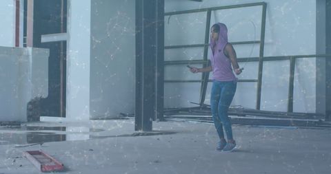 Woman Jumping Rope in Urban Abandoned Building - Download Free Stock Images Pikwizard.com