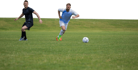Dynamic male soccer players on transparent background