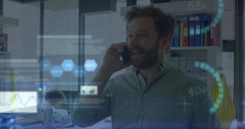 Businessman Analyzing Financial Data on Phone Call in Office - Download Free Stock Images Pikwizard.com
