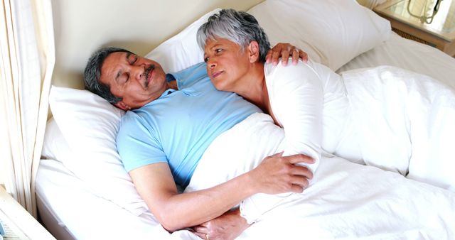 Senior couple sleeping peacefully in bedroom 4k