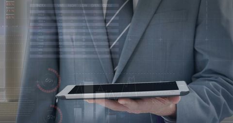 Businessman Analyzing Financial Data Using Tablet Interface - Download Free Stock Images Pikwizard.com