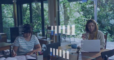 Family Collaboration Asian Mother and Daughter with Digital Interface