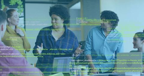 Diverse team discussing software development in modern office