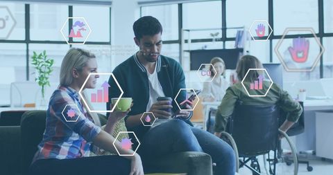 Diverse team discussing ecological data in modern office