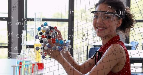 Young Scientist Studying Molecular Structure in Modern Laboratory - Download Free Stock Images Pikwizard.com