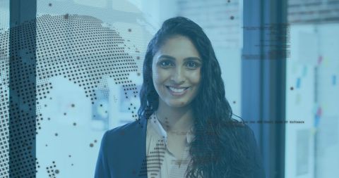 Smiling Woman in Office with Digital Globe and Code Overlay