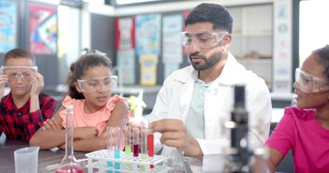 Teacher Demonstrating Science Experiment to Energetic Students - Download Free Stock Images Pikwizard.com