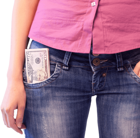 Close-up of dollars in denim pocket on transparent background