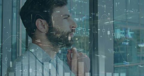 Businessman Contemplating Financial Data with Transparent Graph Overlay