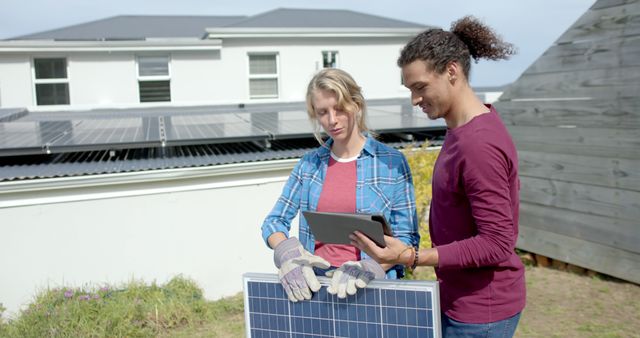 Young Couple Examining Solar Panel with Digital Tablet Outdoors - Download Free Stock Images Pikwizard.com