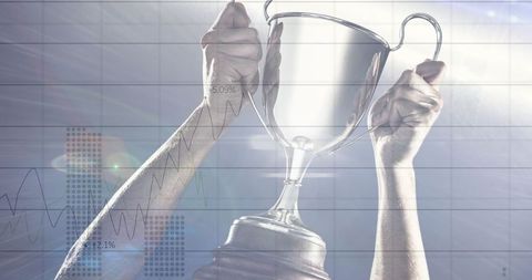 Athlete Holding Trophy with Data Overlay Representing Success