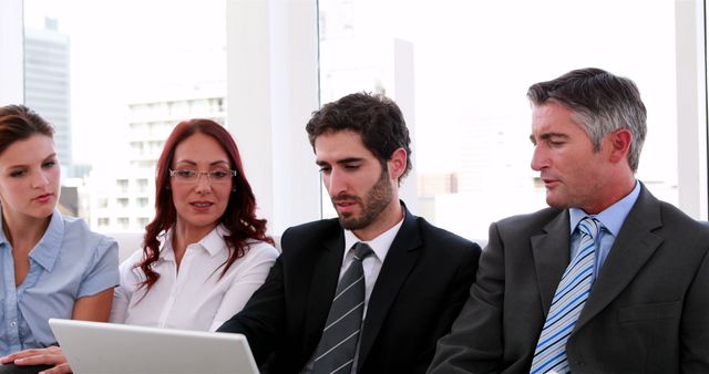 Business Team Collaborating on Laptop in Office Meeting - Download Free Stock Images Pikwizard.com