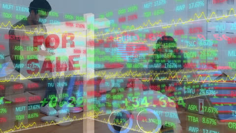 Overlay of Stock Market Data on Business Team and Office Work